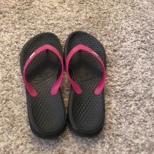 Nike flip flops.